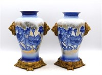 Gilt Lion Head Accented Floral Porcelain Vases.