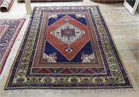 Hand Knotted Rug.