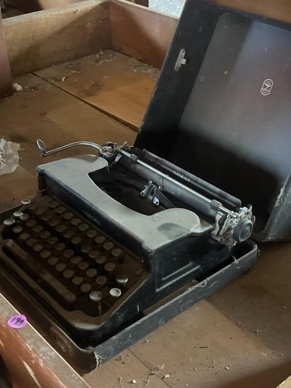Corona silent manual typewriter with case.
