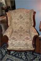 2 Wing back chairs one has claw feet