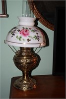 The New Juno brass lamp with floral shade