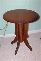 Antique parlor table  23.5" diameter 28" tall