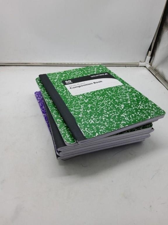 8 green and purple composition notebooks