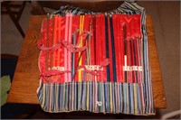 Large assortment of various size knitting needles