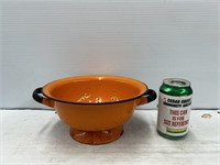 Orange enamelware colander strainer
