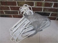 Lot of White Plastic Clothes Hangers
