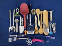 Kitchen Utensils including wooden spoons, ice
