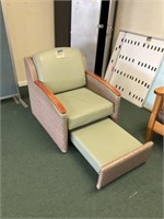 Chair with pullout foot rest on wheels