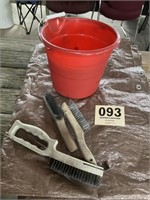 Three wire brushes, and a bucket