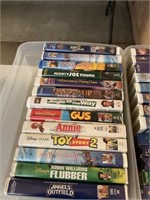 2 containers of vhs movies