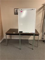 Whiteboard and a metal desk