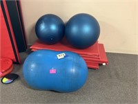 Yoga and exercise balls with mats