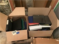 2 boxes of office binders
