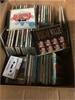Box of CDs mostly country