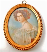 Antique oval portrait of girl in copper frame