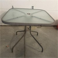 Glass and metal square patio table