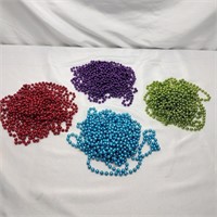 E1) 4- STRANDS OF BEADS