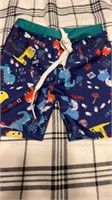 C11) stretchy swim shorts 
Has fit 24m up to 4T