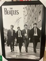 John Lennon signed the Beatles poster