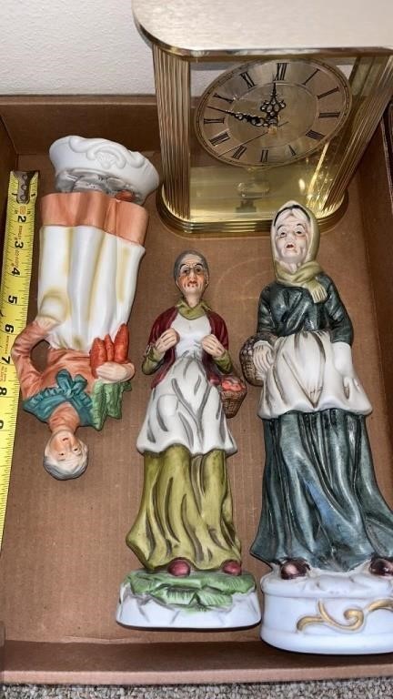 Old women, figurines, quartz clock