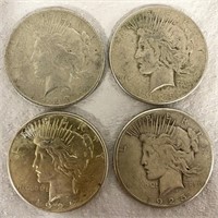 Four Old Silver Dollars