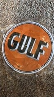 12 in round metal Gulf sign