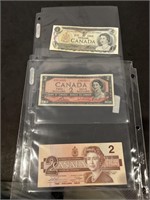 $1 Dollar Bill and Two $2 Dollar Bills