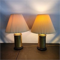 Pair of detailed brass lamps