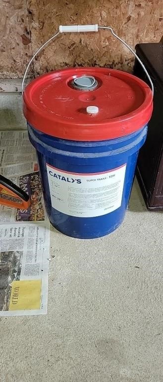New pail of tractor hydraulic oil