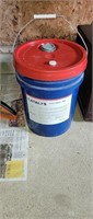 New pail of tractor hydraulic oil