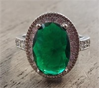 Faceted Oval Cut Emerald Ring