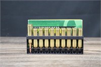 1 Partial- .264 Win. Mag Brass + 2 Rounds