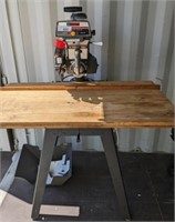 CRAFTSMAN 10 IN RADIAL SAW ON TABLE