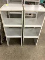 Two particle board storage shelves.  Each is 31.5