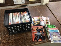 Large lot of video game guides in crate