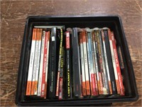 Large lot of video game guides in crate