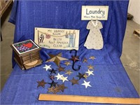 Two laundry wall signs.  Small metal stars.