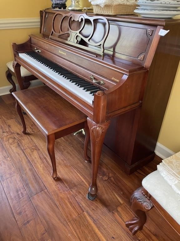 Baldwin upright piano and bench