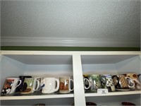 Lots of CAT coffee cups