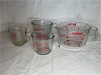 4 glass measuring cups various sizes