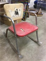 Vintage children’s metal rocking chair