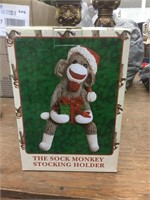 Sock monkey stocking holder