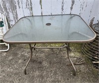 Glass top patio table, 38 " X 32" X 29" tall