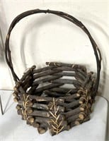 Primitive tree, limb, woven basket