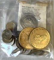Bag of foreign coins/tokens