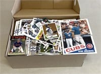 Box full of baseball cards, some damage