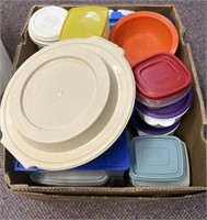 Box full of Tupperware with lids