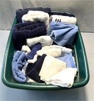 Laundry basket with bath towels/hand