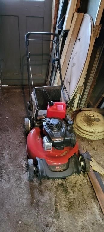Toro gas lawn mower with bag.