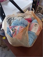 BAG OF YARN AND STARTED BLANKET